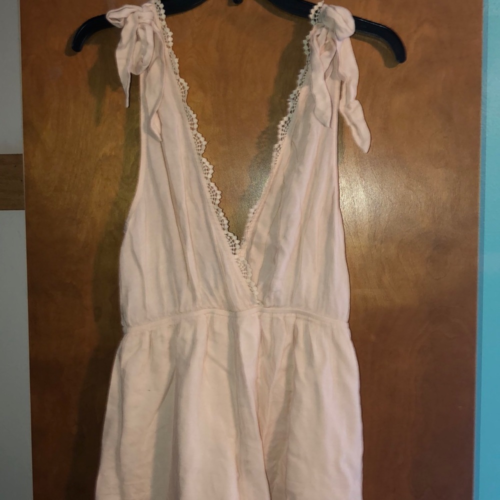 new with tags light pink pac sun romper